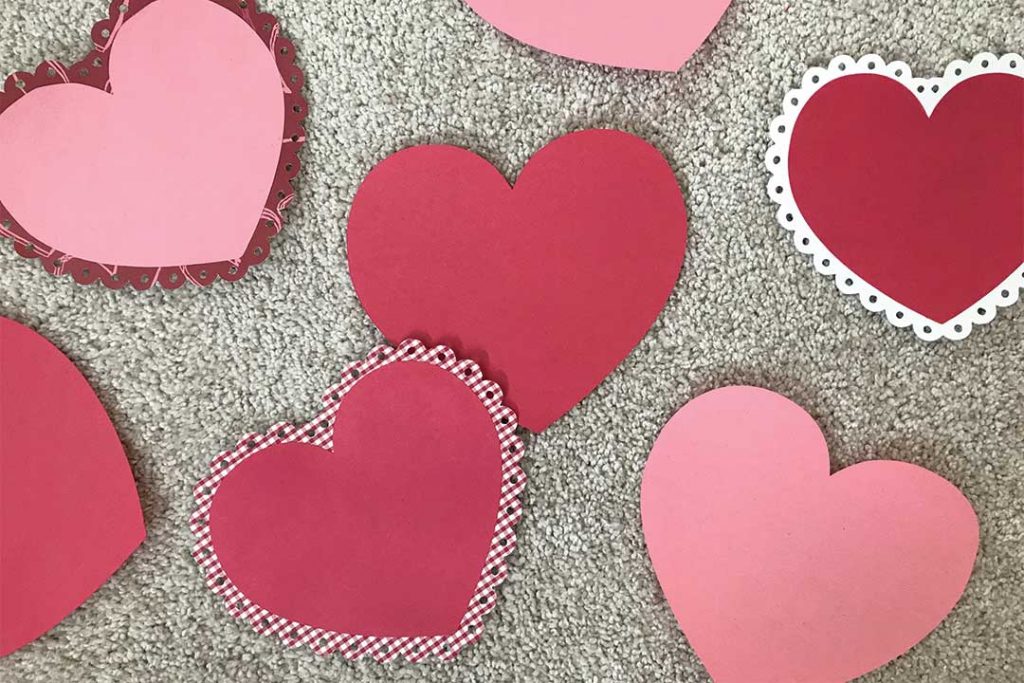 Valentine's Day tradition for kids, paste hearts together