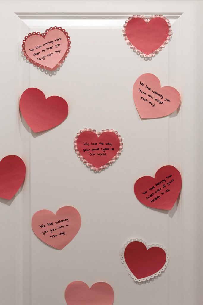 Valentine's Day tradition for kids,
hearts with love notes on kids' doors