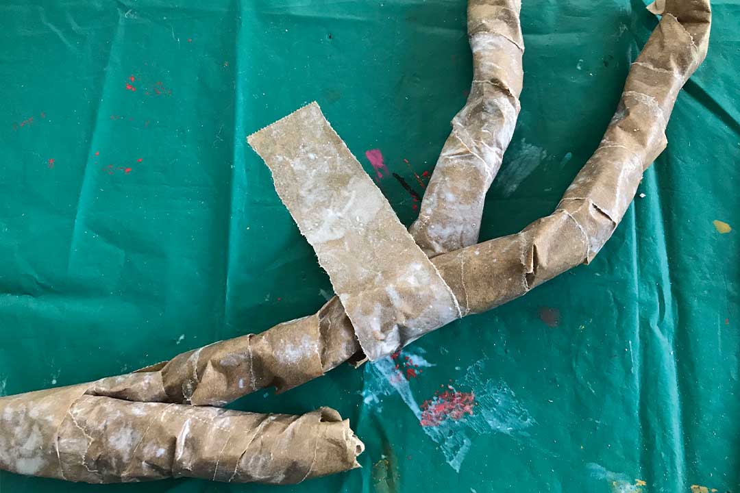 formation of antler made of twisted paper wrapped in paper mache strips