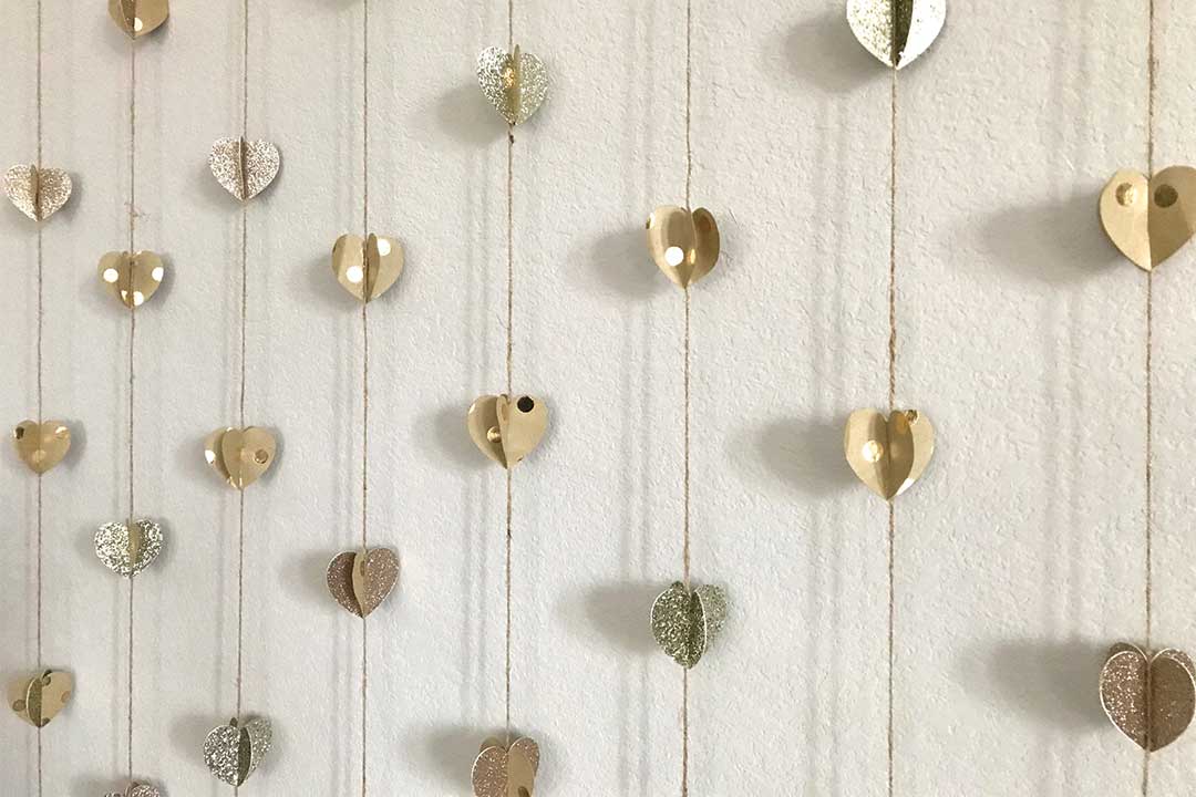 close up image of neutral heart garland 