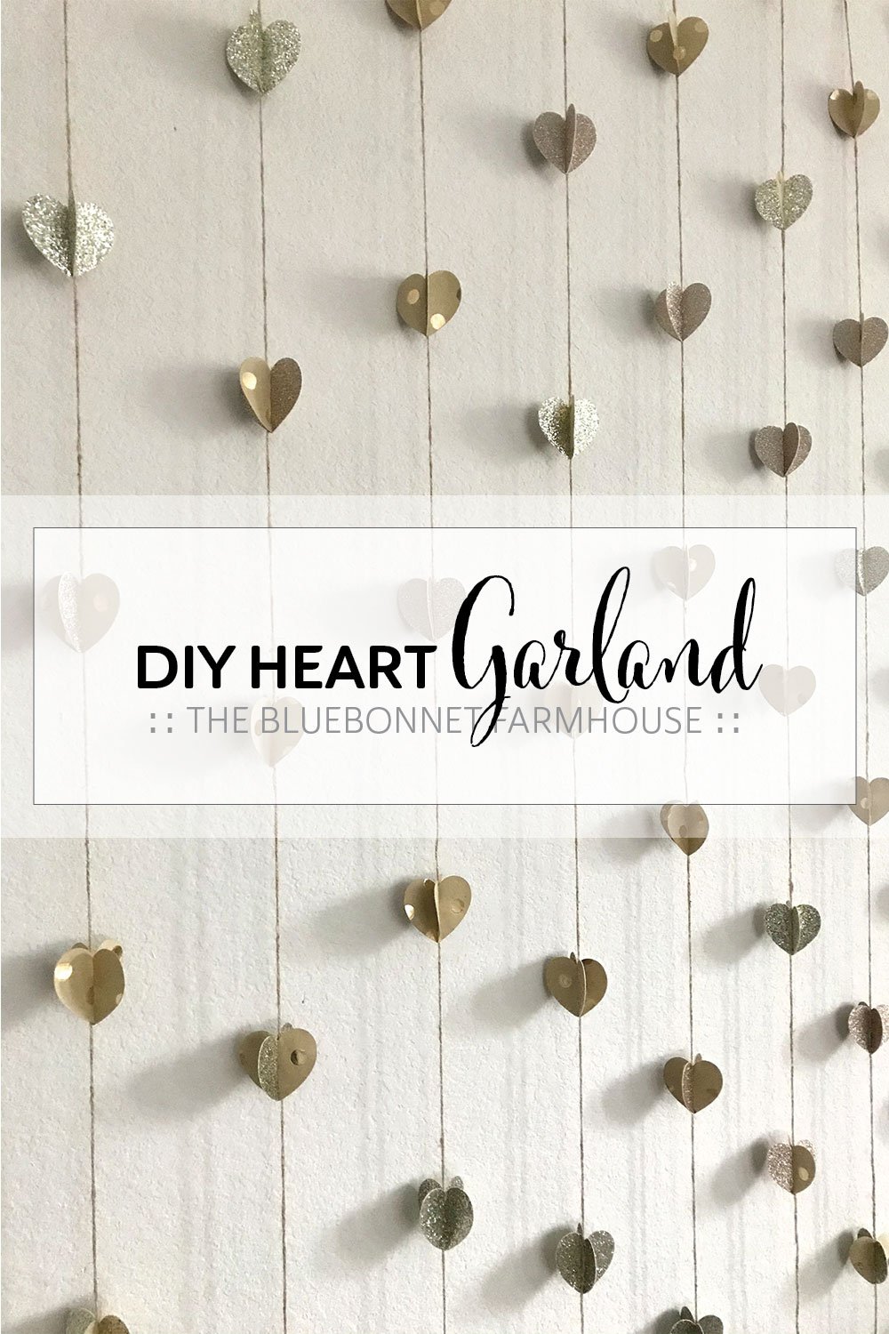 diy heart garland made of glitter paper, neutral tone paper, and twine