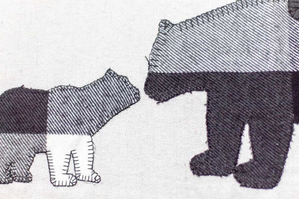 close up of mama and baby bear appliques on drop cloth curtain header