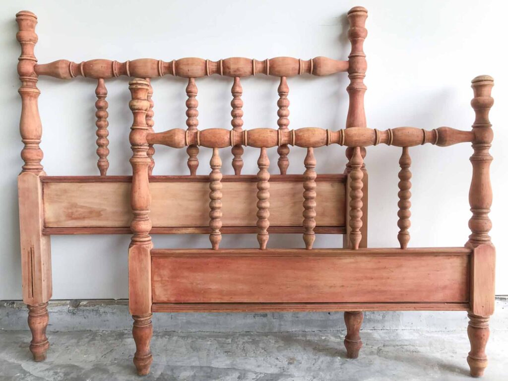 before photo of an antique jenny lind headboard and footboard stripped and sanded of its original finish